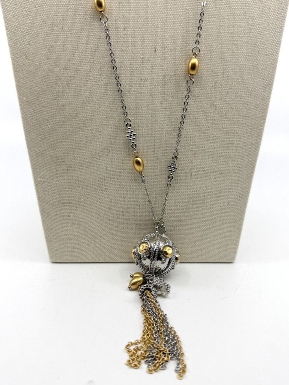 Two-Tone Statement Pendant Necklace with Metallic Tassel Layering